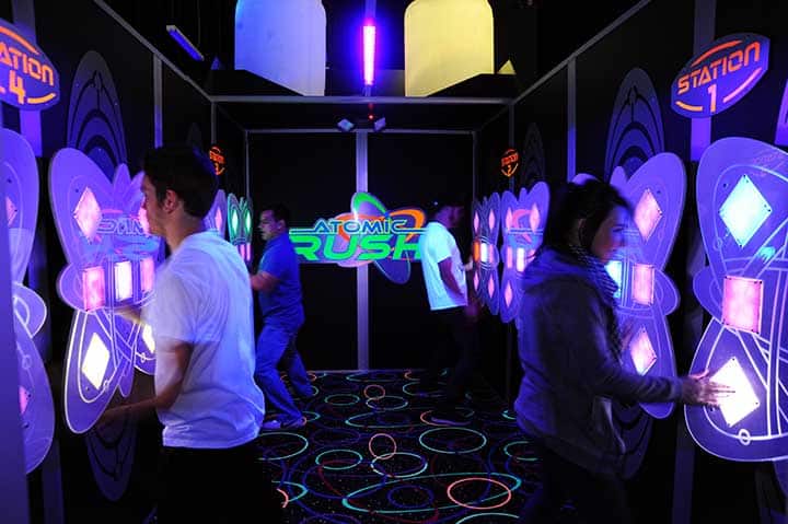 Atomic Rush 1 People playing atomic rush at monster mini golf