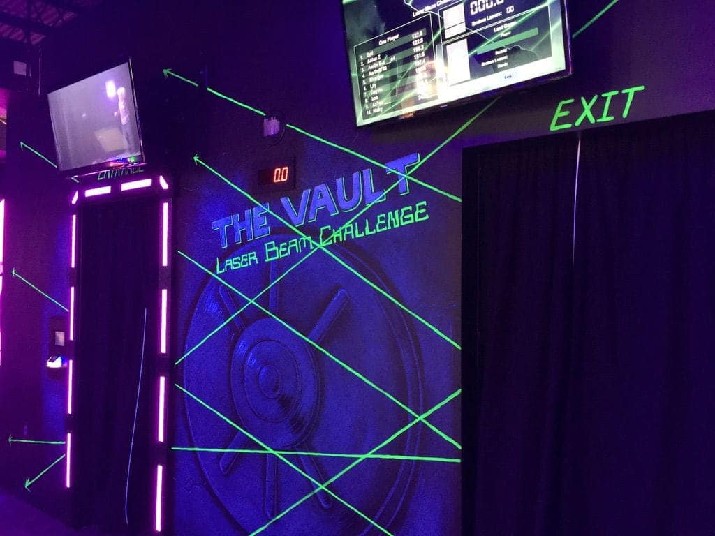 The entrance to the vault "laser beam challenge" at a monster mini golf location.